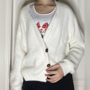 White sweater with buttons